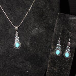 An elegant set of stainless steel Necklace with Turquoise  Pendant & Ear Rings.